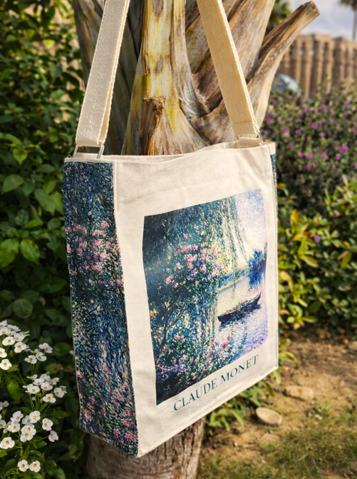 Claude Monet – The Blossomed Riverbank